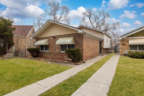 Photo of 7719 S Merrill Avenue, Chicago, IL 60649 (MLS # 12578738)