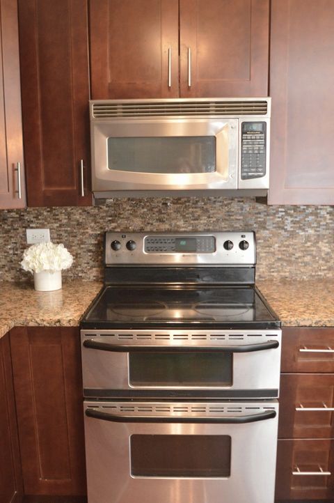 Tiny photo for 5400 Walnut Avenue #111, Downers Grove, IL 60515 (MLS # 12643177)