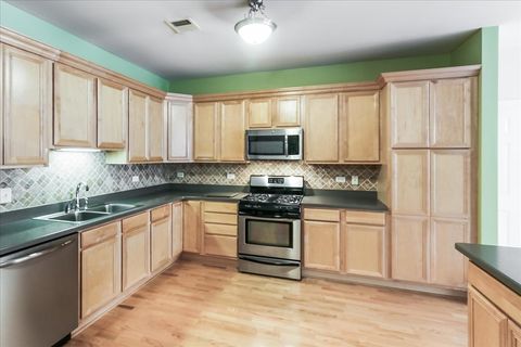 Tiny photo for 275 E Railroad Avenue #101, Bartlett, IL 60103 (MLS # 12454593)