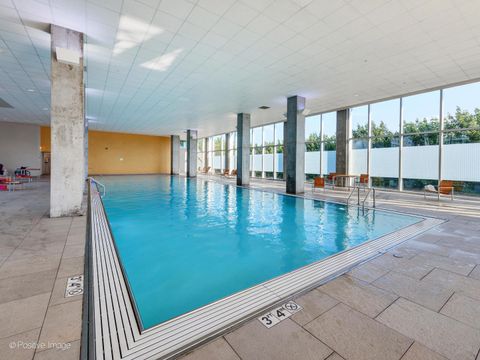 Tiny photo for 9715 Woods Drive #1104, Skokie, IL 60077 (MLS # 12542423)