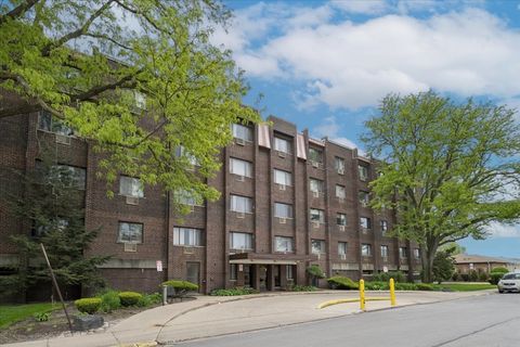 Photo of 8455 W Leland Avenue #204, Chicago, IL 60656 (MLS # 12646982)