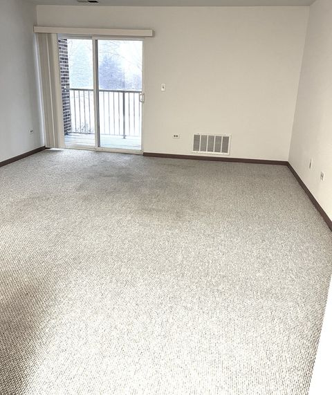 Tiny photo for 801 N McLean Boulevard #214, Elgin, IL 60123 (MLS # 12549232)