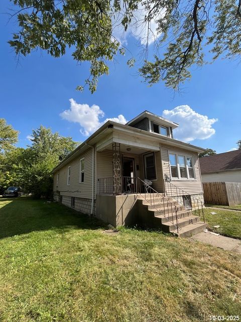 Photo of 12219 S Emerald Avenue, Chicago, IL 60628 (MLS # 12543647)