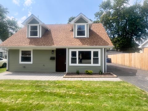 Photo of 11334 S Nashville Avenue, Worth, IL 60482 (MLS # 12343921) Photo of 11334 S Nashville Avenue, Worth, IL 60482 (MLS # 12343921)