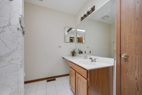 Tiny photo for 216 Brittany Drive #8E-2, Streamwood, IL 60107 (MLS # 12723351)