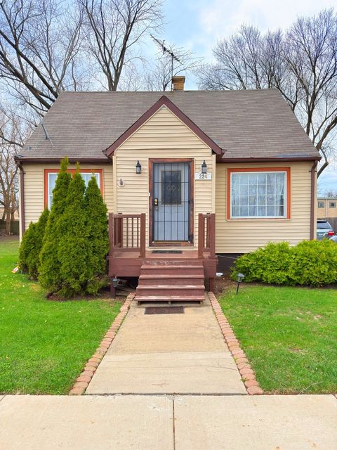 Photo of 224 N WOLF Road, Wheeling, IL 60090 (MLS # 12623579)