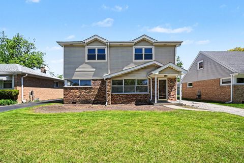 Photo of 8243 N Ozanam Avenue, Niles, IL 60714 (MLS # 12656830)