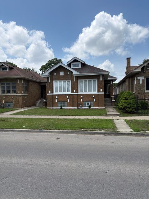 Photo of 7606 S Paxton Avenue, Chicago, IL 60649 (MLS # 12676245)