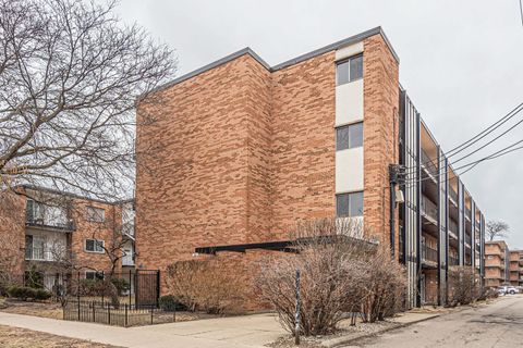 Photo of 6961 N Oakley Avenue #304, Chicago, IL 60645 (MLS # 12577604)