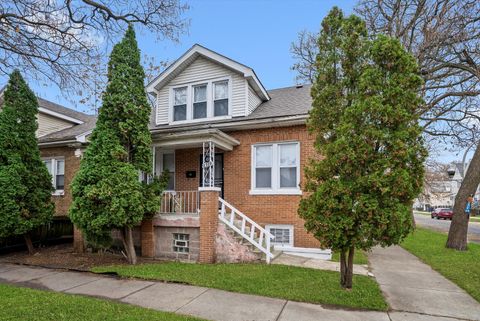 Photo of 8100 S Houston Avenue, Chicago, IL 60617 (MLS # 12407376)