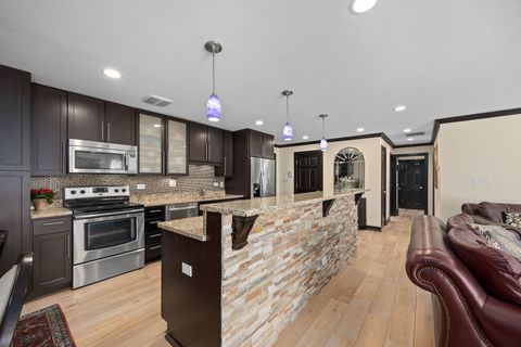 Tiny photo for 140 Carriage Way Drive #C218, Burr Ridge, IL 60527 (MLS # 12617260)