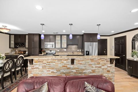 Tiny photo for 140 Carriage Way Drive #C218, Burr Ridge, IL 60527 (MLS # 12617260)