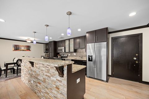 Tiny photo for 140 Carriage Way Drive #C218, Burr Ridge, IL 60527 (MLS # 12617260)