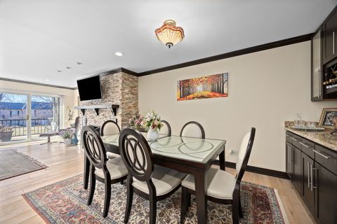 Tiny photo for 140 Carriage Way Drive #C218, Burr Ridge, IL 60527 (MLS # 12617260)