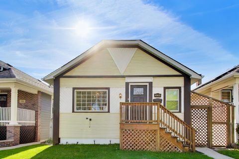 Photo of 2928 N Natchez Avenue, Chicago, IL 60634 (MLS # 12634775)