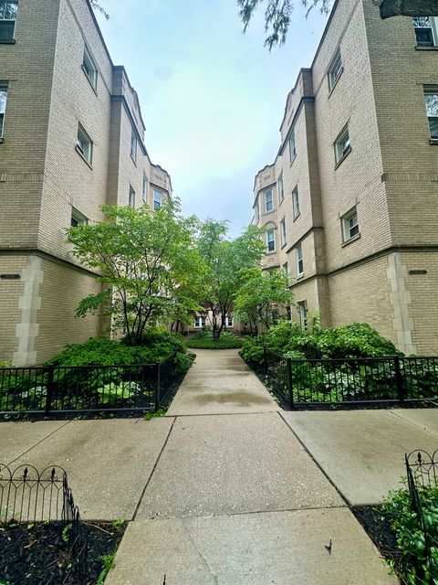 Photo of 1453 W Elmdale Avenue #1, Chicago, IL 60660 (MLS # 12389387)
