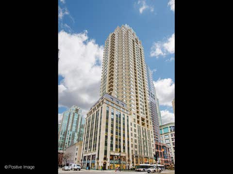 Photo of 118 E Erie Street #21B, Chicago, IL 60611 (MLS # 12691894)