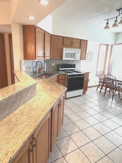 Tiny photo for 9420 S 77th Court #2E, Hickory Hills, IL 60457 (MLS # 12546230)