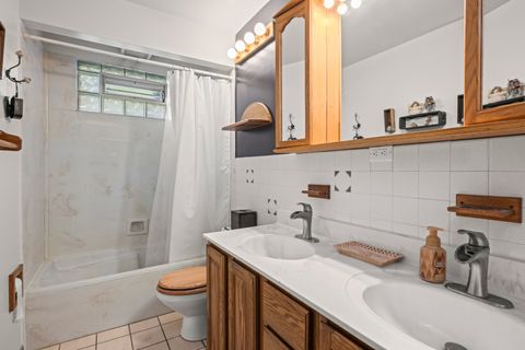 Tiny photo for 7979 Huntington Circle N, Hanover Park, IL 60133 (MLS # 12522601)