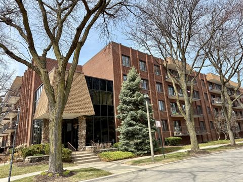 Photo of 5200 Oakton Street #105, Skokie, IL 60077 (MLS # 12602078)