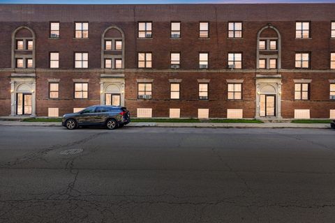 Photo of 953 E 61st Street #1E, Chicago, IL 60637 (MLS # 12516494)