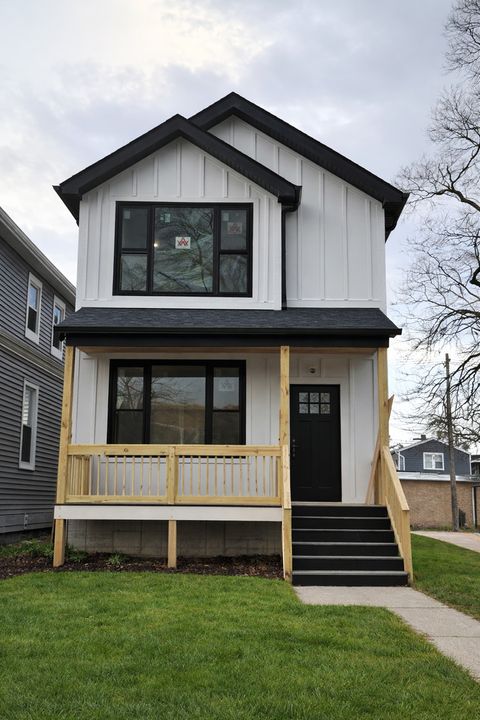 Photo of 5509 W Haddon Avenue, Chicago, IL 60651 (MLS # 12605665)