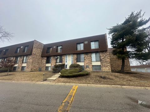 Photo of 202 S Waters Edge Drive #102, Glendale Heights, IL 60139 (MLS # 12518944)