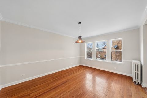 Tiny photo for 2002 W Estes Avenue #1, Chicago, IL 60645 (MLS # 12589999)