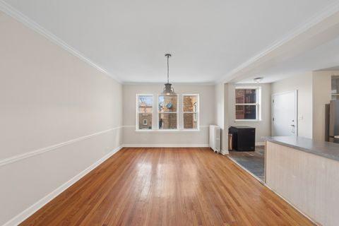 Tiny photo for 2002 W Estes Avenue #1, Chicago, IL 60645 (MLS # 12589999)