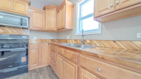 Tiny photo for 9801 S Exchange Avenue, Chicago, IL 60617 (MLS # 12561866)