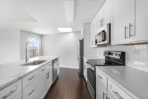 Tiny photo for 1800 Dewes Street #310, Glenview, IL 60025 (MLS # 12578417)