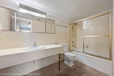 Tiny photo for 5525 E LAKE Drive #A, Lisle, IL 60532 (MLS # 12585329)
