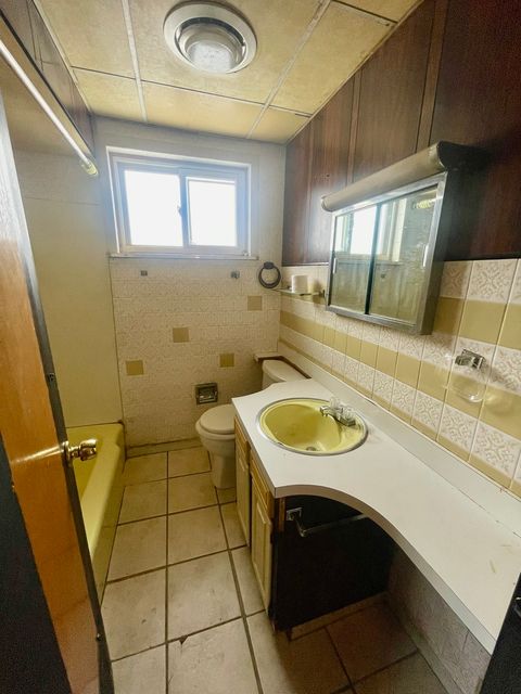 Tiny photo for 9527 S Parnell Avenue, Chicago, IL 60628 (MLS # 12543694)