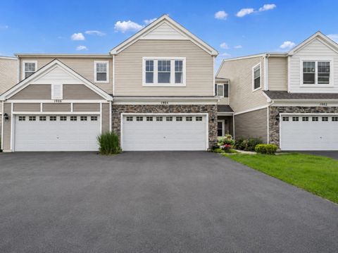 Photo of 1904 Cobblestone Drive, Carpentersville, IL 60110 (MLS # 12680039)
