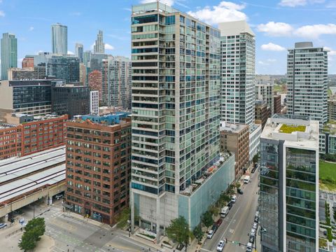 Photo of 611 S Wells Street #2402, Chicago, IL 60607 (MLS # 12462385)