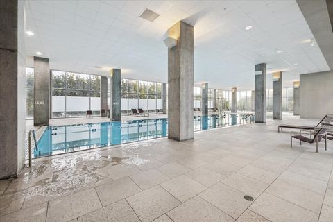 Tiny photo for 9715 Woods Drive #1110, Skokie, IL 60076 (MLS # 12519829)