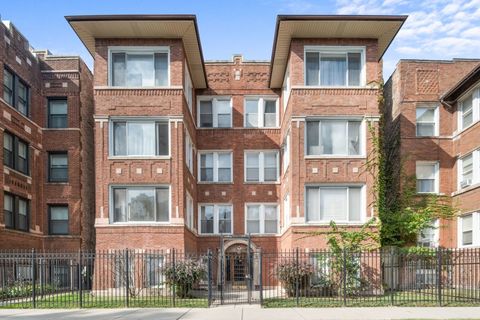 Photo of 6742 S CLYDE Avenue #1S, Chicago, IL 60649 (MLS # 12519374)