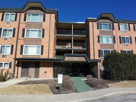 Photo of 1227 S Old Wilke Road #306, Arlington Heights, IL 60005 (MLS # 12447152)