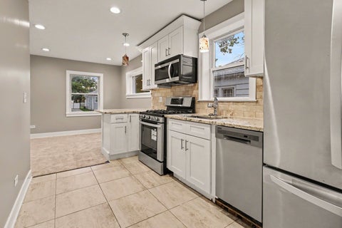 Tiny photo for 1934 S 6th Avenue, Maywood, IL 60153 (MLS # 12754147)