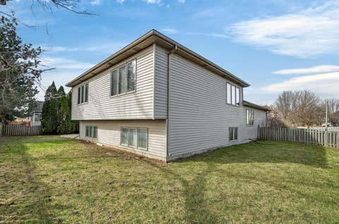 Tiny photo for 420 Windsor Drive, Oswego, IL 60543 (MLS # 12650952)