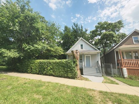 Photo of 12007 S Prairie Avenue, Chicago, IL 60628 (MLS # 12465389)
