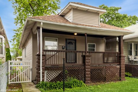 Photo of 10052 S Lafayette Avenue, Chicago, IL 60628 (MLS # 12437751)