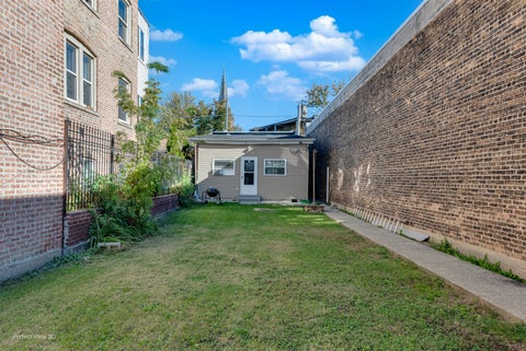 Photo of 3916 W Grand Avenue, Chicago, IL 60651 (MLS # 12726104)