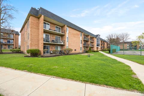 Photo of 1056 N Mill Street #201, Naperville, IL 60563 (MLS # 12682941)