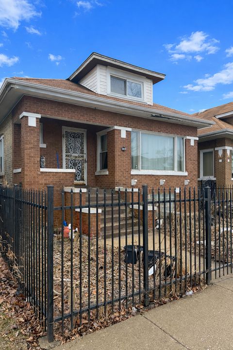 Photo of 1419 N LONG Avenue, Chicago, IL 60651 (MLS # 12593175)