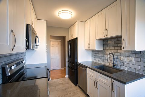 Tiny photo for 6833 N Kedzie Avenue #410, Chicago, IL 60645 (MLS # 12611398)