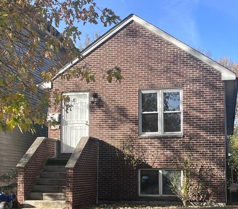 Photo of 11952 S Prairie Avenue, Chicago, IL 60628 (MLS # 12515361)