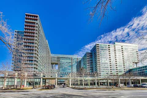 Photo of 9655 Woods Drive #403, Skokie, IL 60077 (MLS # 12707721)