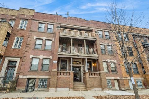 Photo of 5014 S Prairie Avenue #1, Chicago, IL 60615 (MLS # 12540481)
