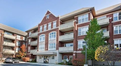 Photo of 77 N Quentin Road #202, Palatine, IL 60067 (MLS # 12498623)